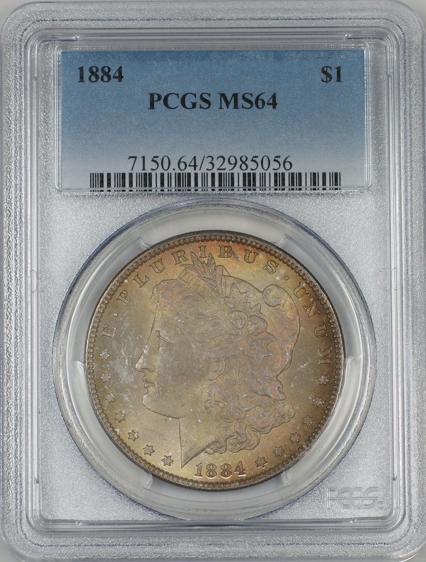 PCGS MS64 1884 Silver Morgan Dollar with Attractive Toning: PCGS MS64 1884 Silver Morgan Dollar with Attractive Toning This 1884 Morgan Silver Dollar $1 coin is graded MS-64 by PCGS and features attractive toning on both the obverse and reverse. Struck in Phil