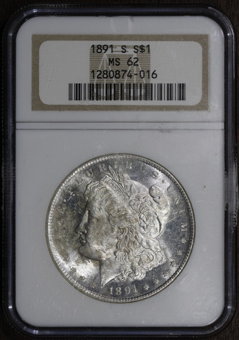 Morgan Dollar 1891 San Francisco MS62 Silver $1 Certified by NGC Semi Prooflike: Morgan Dollar 1891 San Francisco MS62 Silver $1 Certified by NGC Semi Prooflike This 1891-S Morgan Silver Dollar is an uncirculated coin graded MS62 by NGC, featuring a semi proof-like appearance. Min