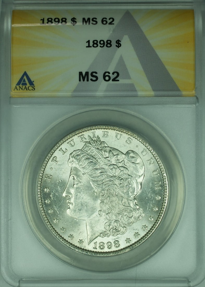 1898 ANACS MS-62 Morgan Dollar Silver Coin from Philadelphia: 1898 ANACS MS-62 Morgan Dollar Silver Coin from Philadelphia This 1898 Morgan Silver Dollar $1 coin is certified by ANACS with a grade of MS-62. Minted in Philadelphia, it is composed of silver and re