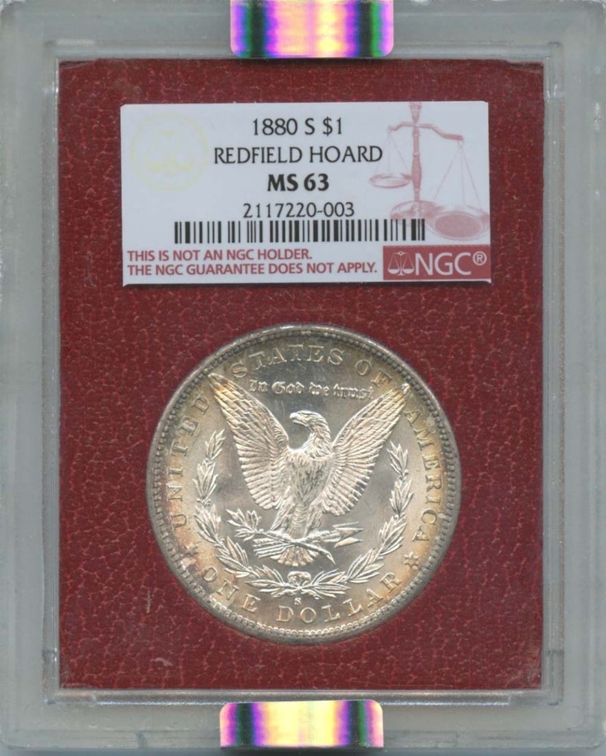 1880-S Morgan Dollar Redfield Hoard NGC MS63 Uncirculated: 1880-S Morgan Dollar Redfield Hoard NGC MS63 Uncirculated This 1880-S Morgan Dollar is a remarkable piece, certified by NGC with a grade of MS63, indicating its uncirculated condition. Struck in San F