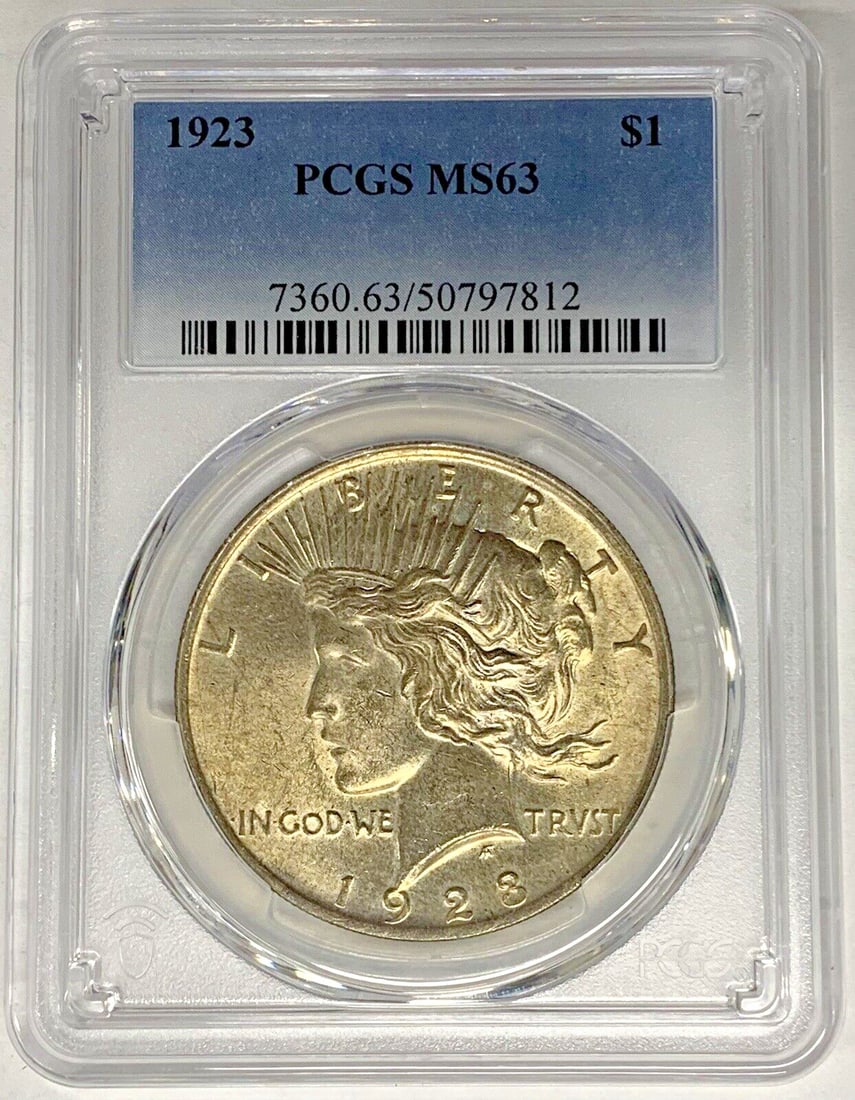 PCGS MS 63 1923 Peace Dollar Silver Coin with Toning: PCGS MS 63 1923 Peace Dollar Silver Coin with Toning This is a 1923 Peace Silver Dollar coin from the United States, featuring a toned finish. The coin is uncirculated and has been graded MS 63 by PCG