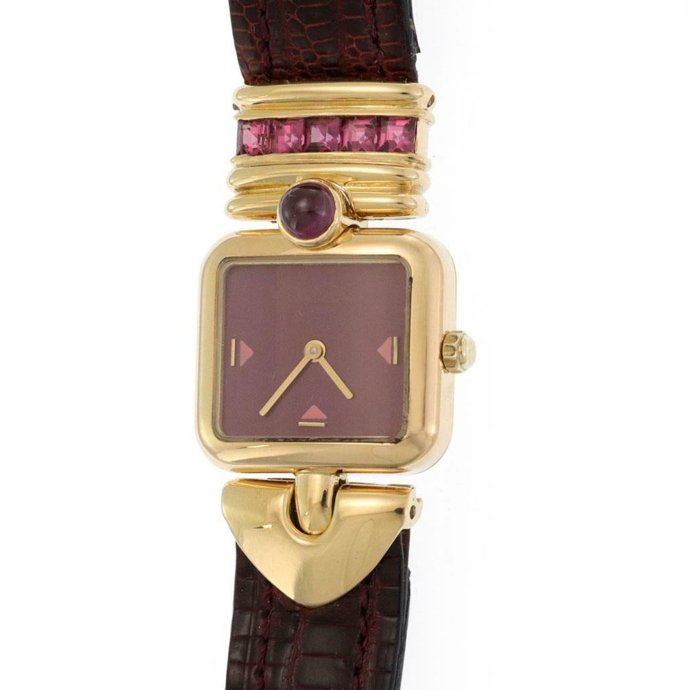 La Nouvelle Bague 18k Yellow Gold Ladies Watch with Rhodolite and Tourmaline: La Nouvelle Bague 18k Yellow Gold Ladies Watch with Rhodolite and Tourmaline This exquisite ladies wristwatch by La Nouvelle Bague features a stunning design crafted from 18k yellow gold with a polish
