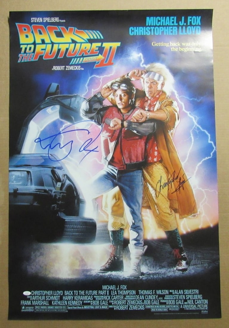 Michael J Fox Christopher Lloyd Signed 27x40 Back to the Future II Poster JSA Authenticated: Michael J Fox Christopher Lloyd Signed 27x40 Back to the Future II Poster JSA Authenticated Capture a piece of cinematic history with this original autographed poster featuring the legendary stars Mic
