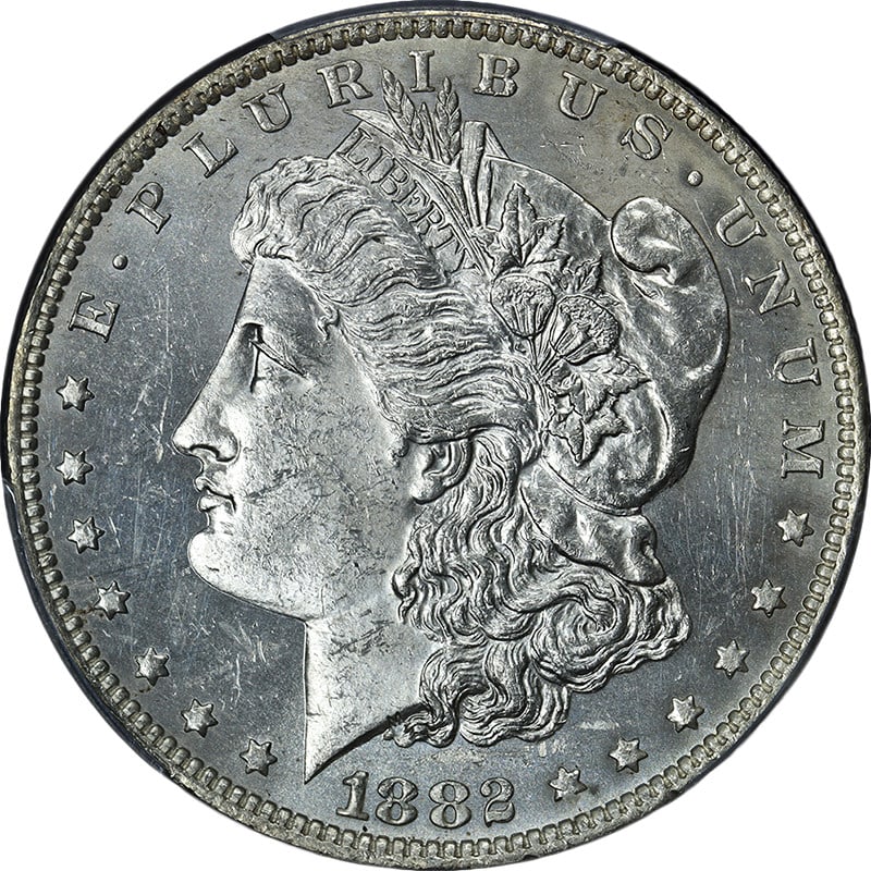 PCGS MS63 PL 1882-O Morgan Dollar Uncirculated Blast White Silver Coin: PCGS MS63 PL 1882-O Morgan Dollar Uncirculated Blast White Silver Coin This 1882-O Morgan Silver Dollar is certified by PCGS and graded MS63 Prooflike (PL). The coin is uncirculated, featuring a blast