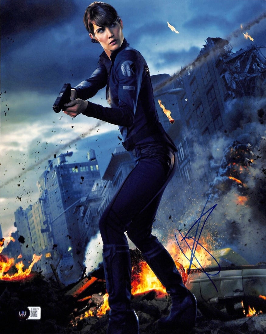Cobie Smulders Signed 11X14 Photograph as Maria Hill Beckett Certified: Cobie Smulders Signed 11X14 Photograph as Maria Hill Beckett Certified This stunning 11x14 photograph captures Cobie Smulders as Maria Hill in The Avengers, beautifully signed in blue permanent marker