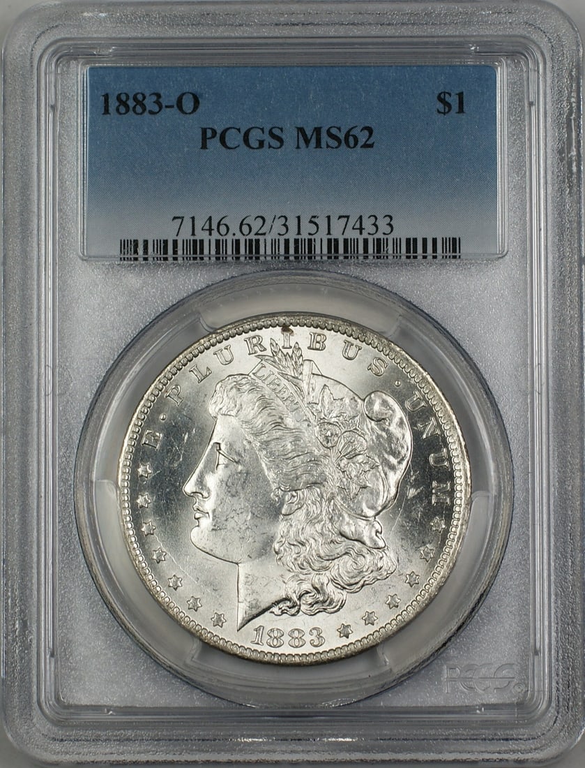 PCGS MS62 1883-O Silver Morgan Dollar from New Orleans Mint: PCGS MS62 1883-O Silver Morgan Dollar from New Orleans Mint This 1883-O Morgan Silver Dollar is graded MS-62 by PCGS. Minted in New Orleans in 1883, this uncirculated coin is composed of silver and is