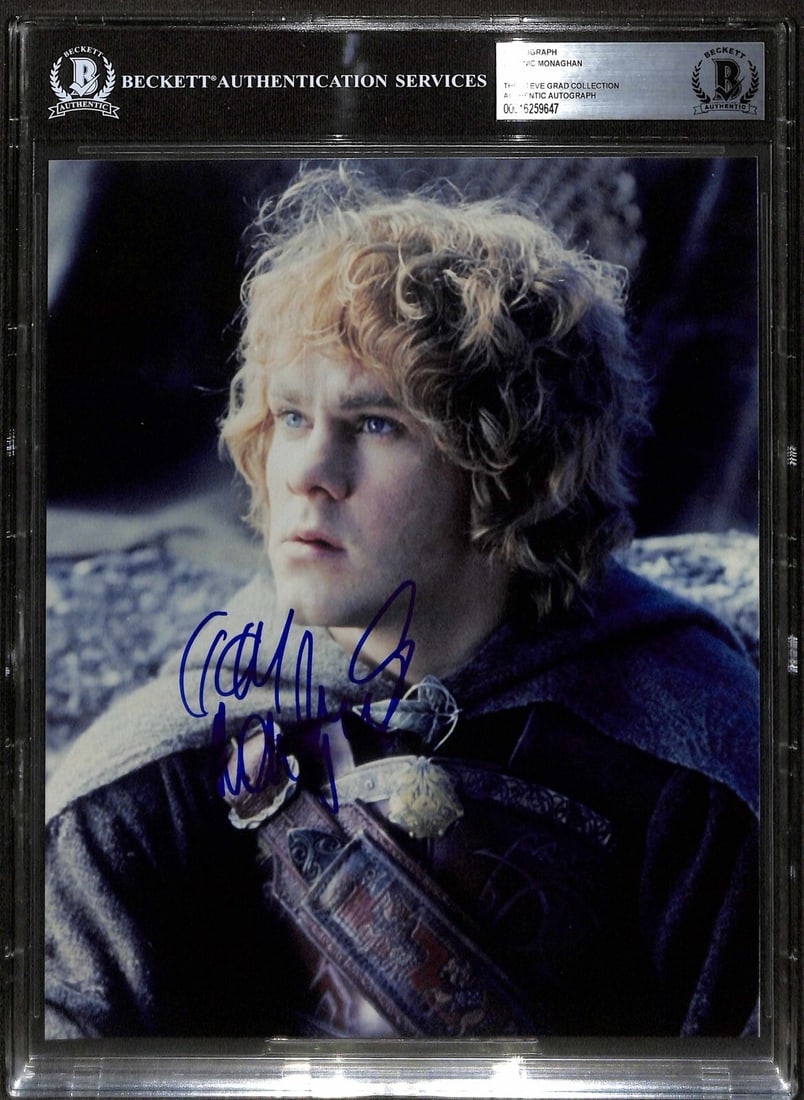 Dominic Monaghan Signed 8x10 Photo Lord of the Rings Beckett Authenticated: Dominic Monaghan Signed 8x10 Photo Lord of the Rings Beckett Authenticated This is an autographed 8x10 photograph of Dominic Monaghan, who portrayed Meriadoc 'Merry' Brandybuck in the Lord of the Ring