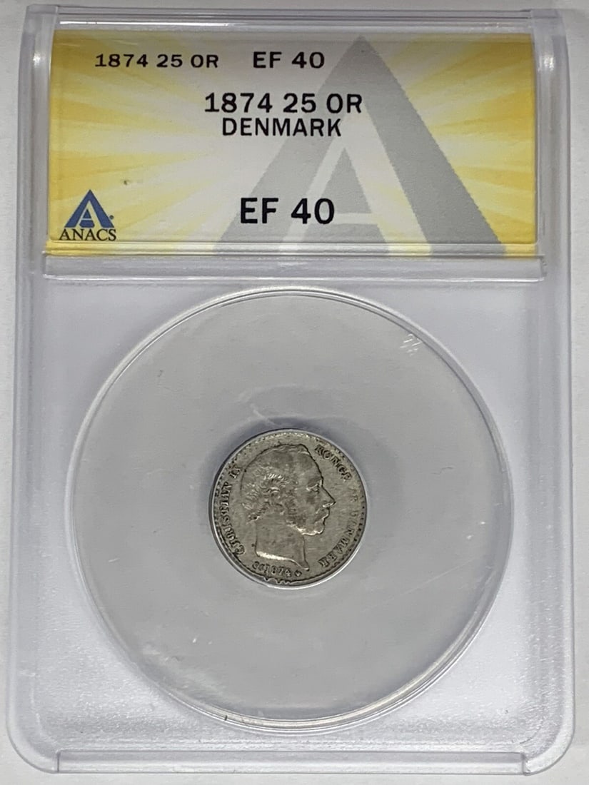 Silver 25 Ore Denmark Coin 1874 ANACS XF 40 Certified: Silver 25 Ore Denmark Coin 1874 ANACS XF 40 Certified This is an 1874 Denmark 25 Ore coin composed of silver. The coin has been graded XF 40 by ANACS and is certified as authentic. It is a pre-owned c