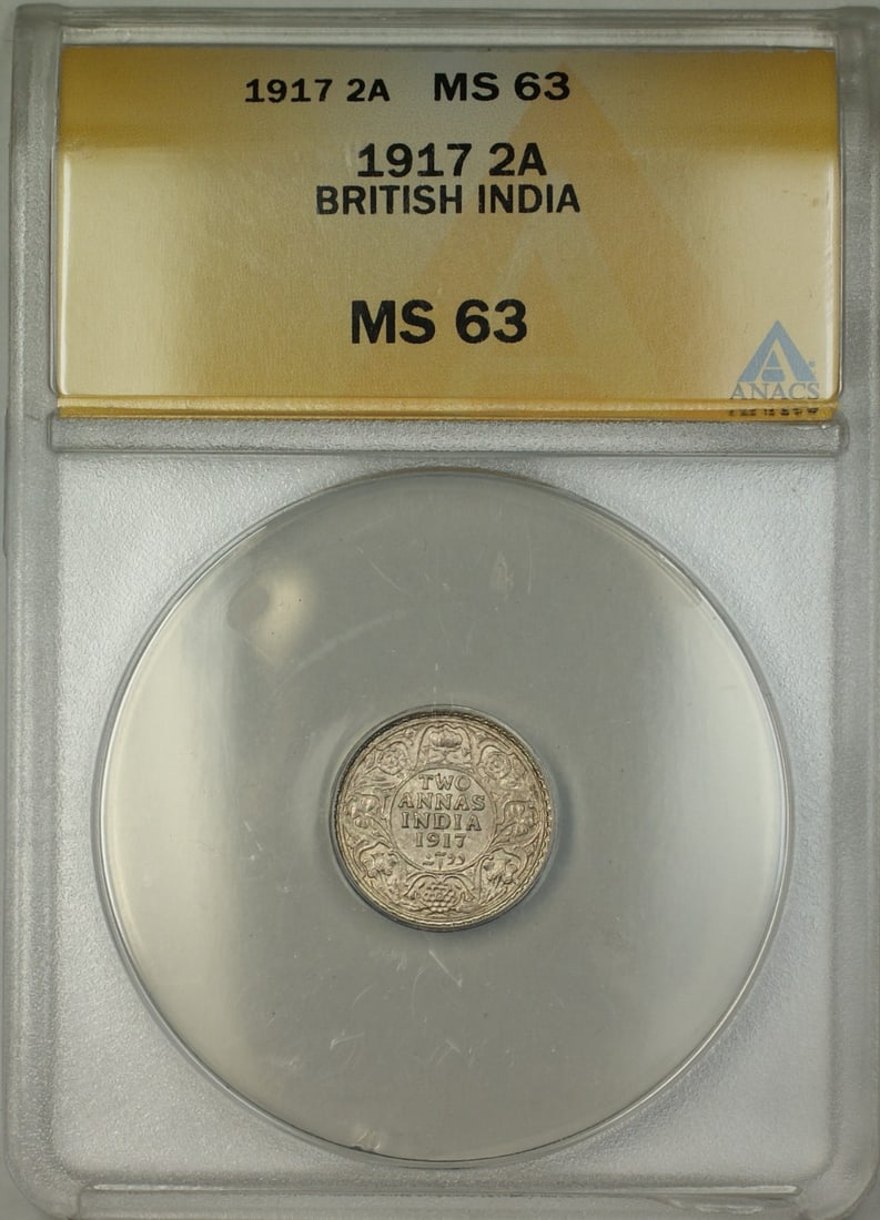 1917 Two Annas Silver Coin from British India ANACS MS 63 Certified: 1917 Two Annas Silver Coin from British India ANACS MS 63 Certified This 1917 British India 2 Annas coin is composed of silver and comes graded as MS 63 by ANACS. The coin is uncirculated and certifie