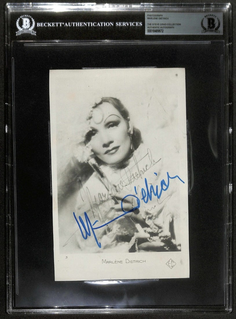 Marlene Dietrich Signed 5x7 Vintage Photo Beckett Certified: Marlene Dietrich Signed 5x7 Vintage Photo Beckett Certified This stunning 5x7 vintage photograph showcases the legendary actress and singer Marlene Dietrich, hand-signed in bold blue ink. The photogra