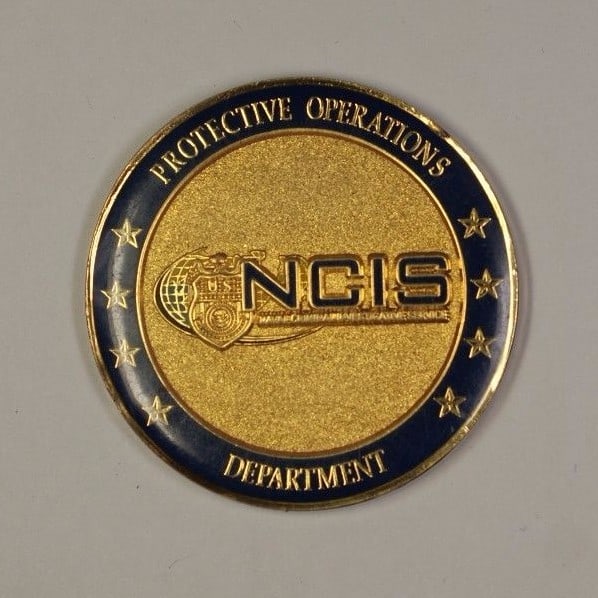 Bronze Challenge Coin from United States Navy NCIS: Bronze Challenge Coin from United States Navy NCIS This United States Navy NCIS (Naval Criminal Investigative Service) challenge coin is composed of bronze and originates from the United States. It is