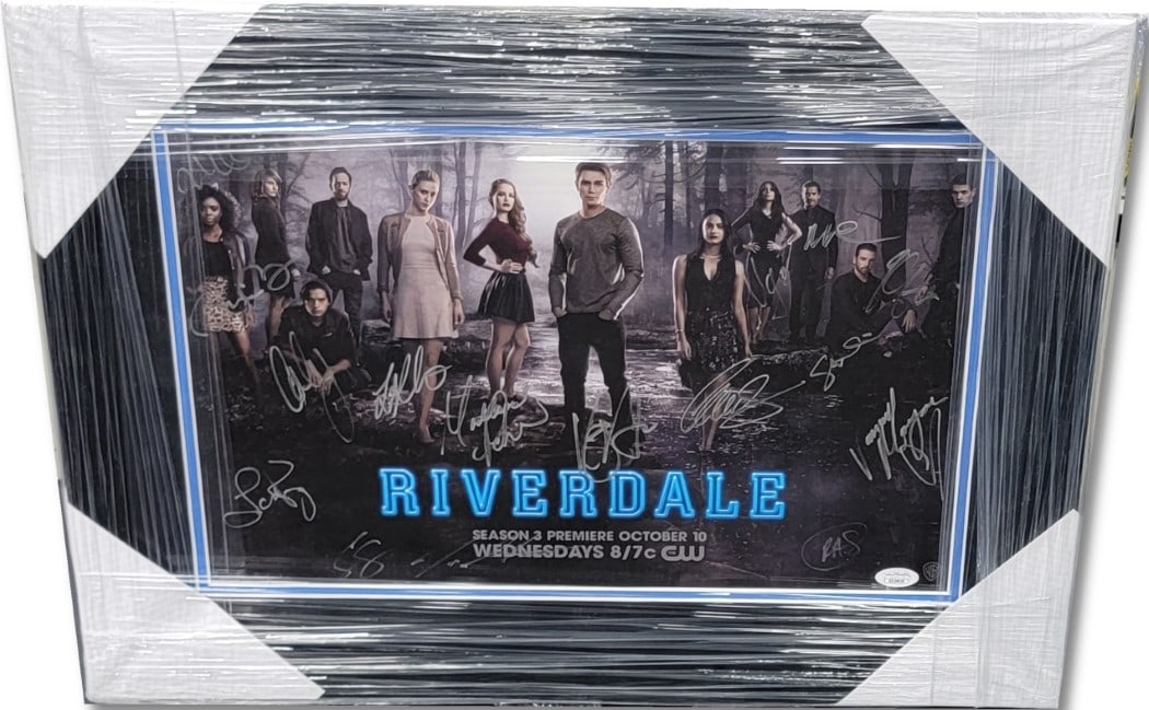 Riverdale Cast Signed 11x17 Photo Framed JSA Authenticated: Riverdale Cast Signed 11x17 Photo Framed JSA Authenticated Celebrate the beloved Riverdale series with this stunning autographed 11x17 photograph featuring the signatures of the main cast. This origin