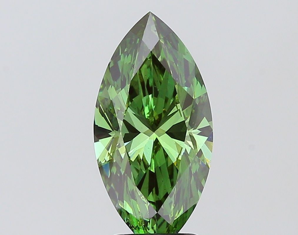Loose Diamond - MARQUISE 3.03ct Fancy Vivid Green VS2: Loose Diamond - MARQUISE 3.03ct Fancy Vivid Green VS2 Source: This is a real non-mined Diamond that has been grown in a lab Shape: MARQUISE Carats: 3.03 Color: Fancy Vivid Green Certification: IGI Add