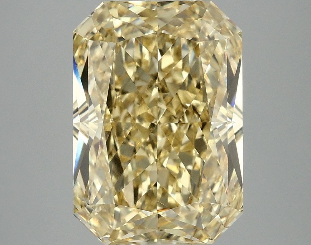 Loose Diamond - RADIANT 5.08ct Fancy Vivid Yellow VS2: Loose Diamond - RADIANT 5.08ct Fancy Vivid Yellow VS2 Source: This is a real non-mined Diamond that has been grown in a lab Shape: RADIANT Carats: 5.08 Color: Fancy Vivid Yellow Certification: IGI Vid