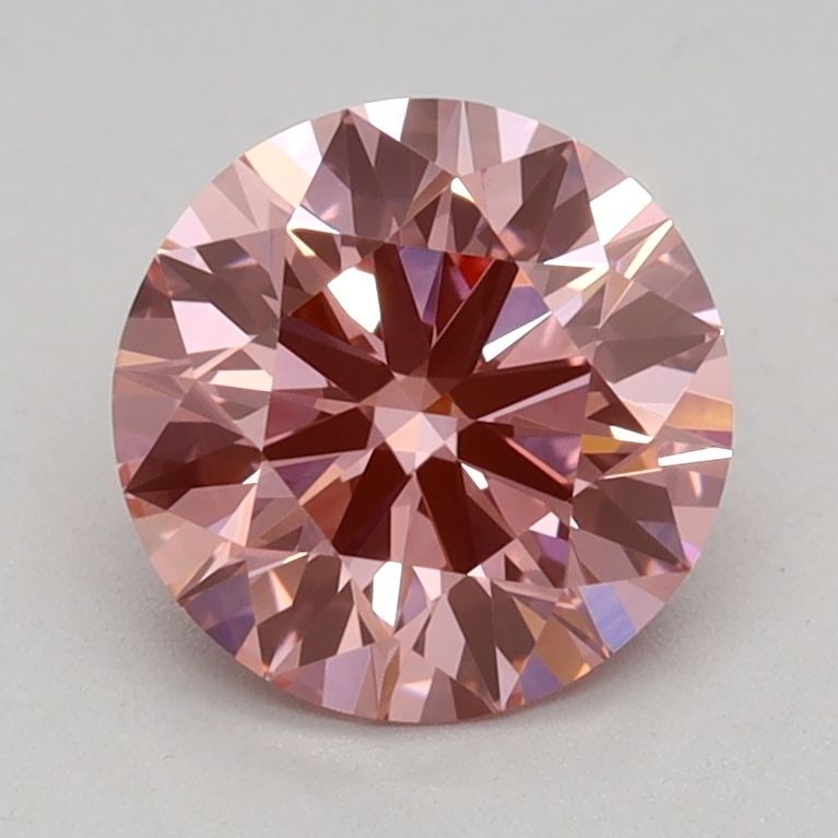 Ideal Loose Diamond - ROUND 1.11ct Fancy Vivid Pink VVS2: Ideal Loose Diamond - ROUND 1.11ct Fancy Vivid Pink VVS2 Source: This is a real non-mined Diamond that has been grown in a lab Shape: ROUND Carats: 1.11 Color: Fancy Vivid Pink Certification: IGI Vide