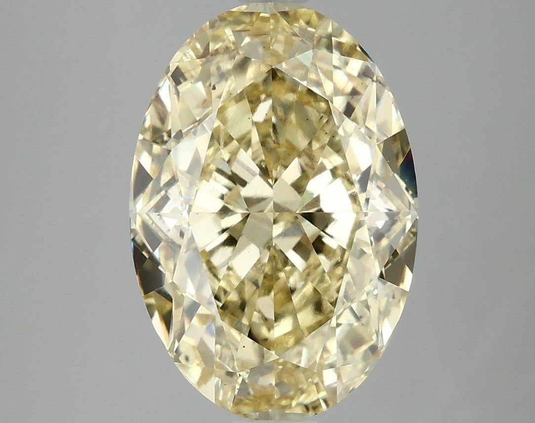 Loose Diamond - OVAL 5.06ct Fancy Vivid Yellow VS2: Loose Diamond - OVAL 5.06ct Fancy Vivid Yellow VS2 Source: This is a real non-mined Diamond that has been grown in a lab Shape: OVAL Carats: 5.06 Color: Fancy Vivid Yellow Certification: IGI Video: