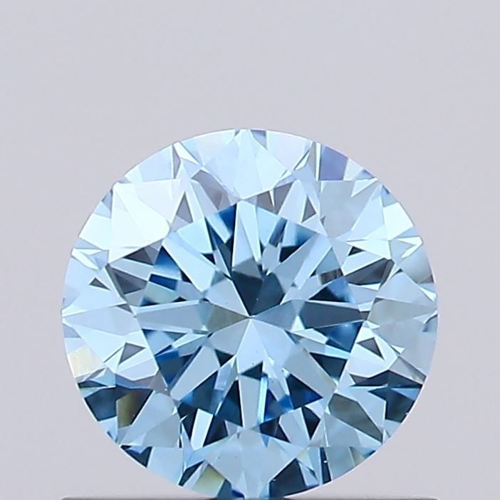 Loose Diamond - ROUND 0.59ct Fancy Vivid Blue VVS2: Loose Diamond - ROUND 0.59ct Fancy Vivid Blue VVS2 Source: This is a real non-mined Diamond that has been grown in a lab Shape: ROUND Carats: 0.59 Color: Fancy Vivid Blue Certification: IGI Video: