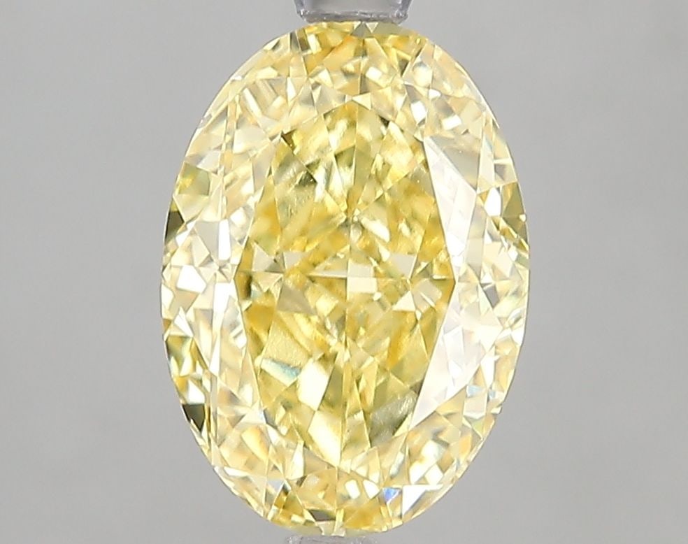Loose Diamond - OVAL 2.83ct Fancy Vivid Yellow VVS2: Loose Diamond - OVAL 2.83ct Fancy Vivid Yellow VVS2 Source: This is a real non-mined Diamond that has been grown in a lab Shape: OVAL Carats: 2.83 Color: Fancy Vivid Yellow Certification: IGI Video: