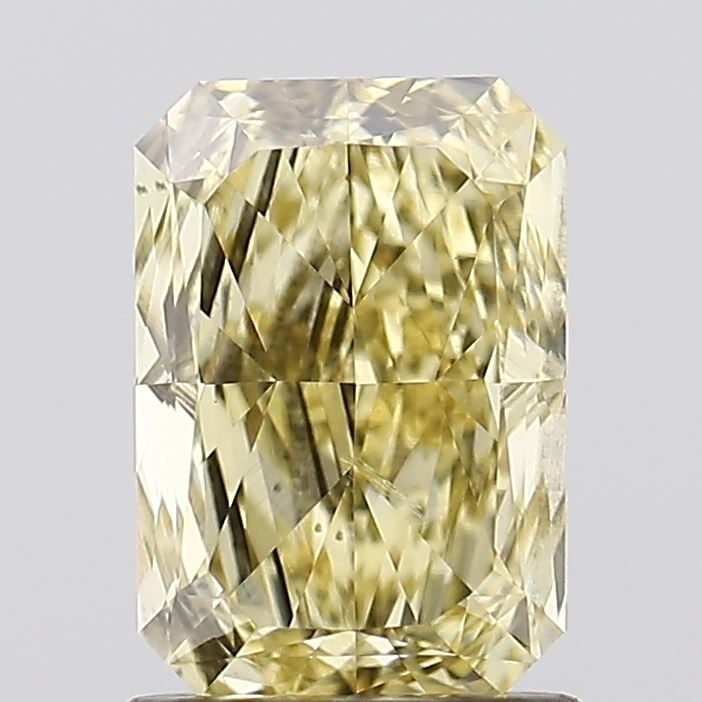 Loose Diamond - RADIANT 1.5ct Fancy Intense Yellow SI1: Loose Diamond - RADIANT 1.5ct Fancy Intense Yellow SI1 Source: This is a real non-mined Diamond that has been grown in a lab Shape: RADIANT Carats: 1.5 Color: Fancy Intense Yellow Certification: IGI V