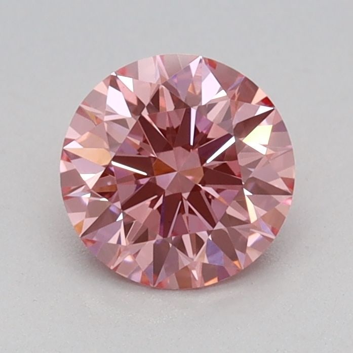 Ideal Loose Diamond - ROUND 0.61ct Fancy Vivid Pink VS1: Ideal Loose Diamond - ROUND 0.61ct Fancy Vivid Pink VS1 Source: This is a real non-mined Diamond that has been grown in a lab Shape: ROUND Carats: 0.61 Color: Fancy Vivid Pink Certification: IGI Video