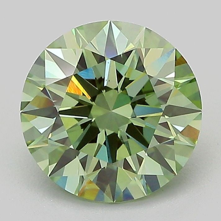 Ideal Loose Diamond - ROUND 2.1ct Fancy Vivid Green VS1: Ideal Loose Diamond - ROUND 2.1ct Fancy Vivid Green VS1 Source: This is a real non-mined Diamond that has been grown in a lab Shape: ROUND Carats: 2.1 Color: Fancy Vivid Green Certification: IGI Video