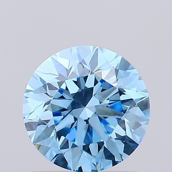Loose Diamond - ROUND 0.89ct Fancy Vivid Blue VS1: Loose Diamond - ROUND 0.89ct Fancy Vivid Blue VS1 Source: This is a real non-mined Diamond that has been grown in a lab Shape: ROUND Carats: 0.89 Color: Fancy Vivid Blue Certification: IGI Video: