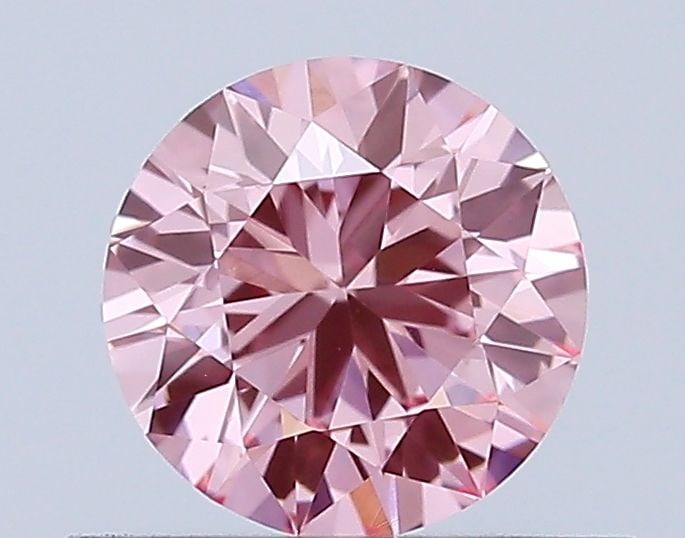 Loose Diamond - ROUND 0.49ct Fancy Vivid Pink VS1: Loose Diamond - ROUND 0.49ct Fancy Vivid Pink VS1 Source: This is a real non-mined Diamond that has been grown in a lab Shape: ROUND Carats: 0.49 Color: Fancy Vivid Pink Certification: IGI Video: