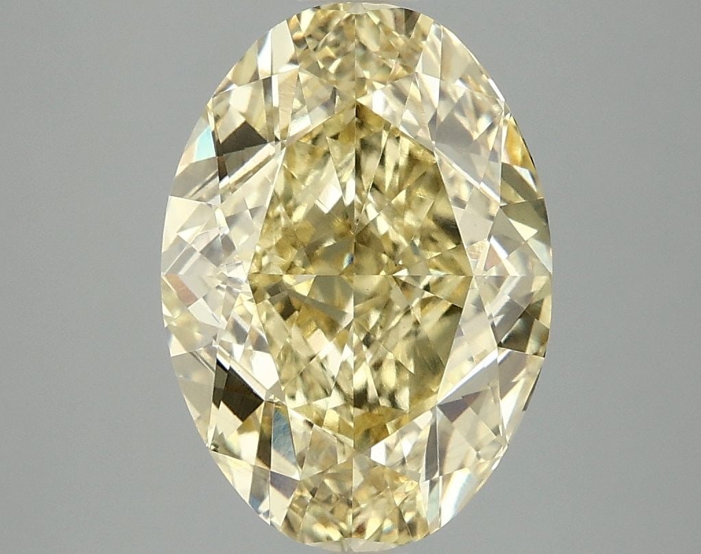 Loose Diamond - OVAL 4.1ct Fancy Vivid Yellow VS2: Loose Diamond - OVAL 4.1ct Fancy Vivid Yellow VS2 Source: This is a real non-mined Diamond that has been grown in a lab Shape: OVAL Carats: 4.1 Color: Fancy Vivid Yellow Certification: IGI Video: