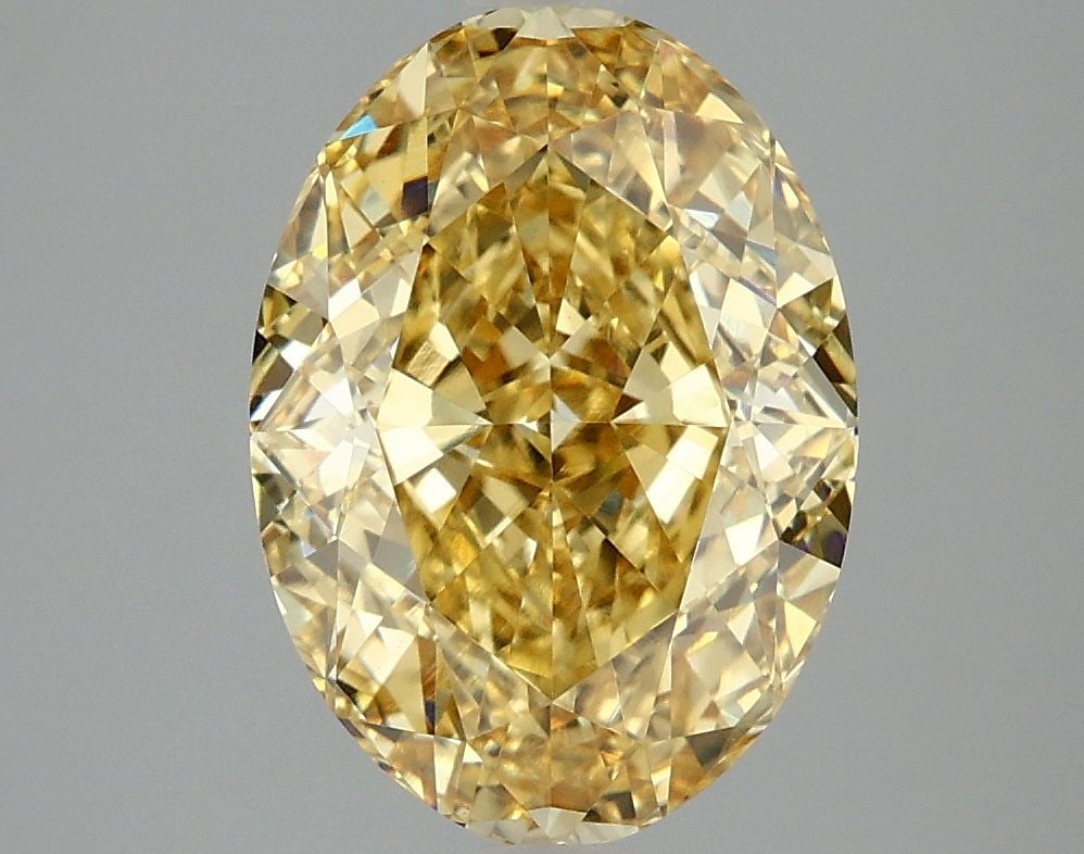 Loose Diamond - OVAL 4.05ct Fancy Vivid Yellow VVS2: Loose Diamond - OVAL 4.05ct Fancy Vivid Yellow VVS2 Source: This is a real non-mined Diamond that has been grown in a lab Shape: OVAL Carats: 4.05 Color: Fancy Vivid Yellow Certification: IGI Video: