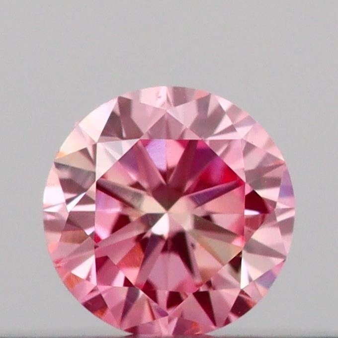 Loose Diamond - ROUND 0.13ct Fancy Intense Pink VVS2: Loose Diamond - ROUND 0.13ct Fancy Intense Pink VVS2 Source: This is a real non-mined Diamond that has been grown in a lab Shape: ROUND Carats: 0.13 Color: Fancy Intense Pink Certification: IGI Video: