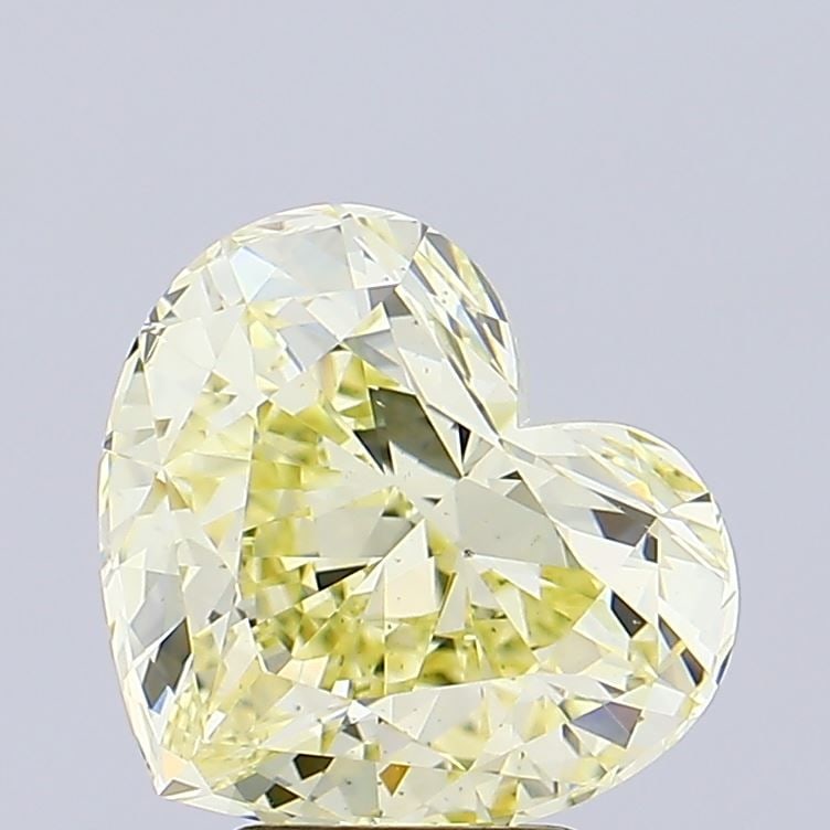 Loose Diamond - HEART 4.41ct Fancy Light Yellow VS1: Loose Diamond - HEART 4.41ct Fancy Light Yellow VS1 Source: This is a real non-mined Diamond that has been grown in a lab Shape: HEART Carats: 4.41 Color: Fancy Light Yellow Certification: IGI Video: