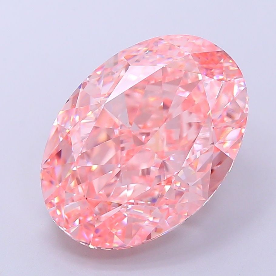 Loose Diamond - OVAL 10.1ct Fancy Vivid Pink VVS2: Loose Diamond - OVAL 10.1ct Fancy Vivid Pink VVS2 Source: This is a real non-mined Diamond that has been grown in a lab Shape: OVAL Carats: 10.1 Color: Fancy Vivid Pink Certification: IGI Video: