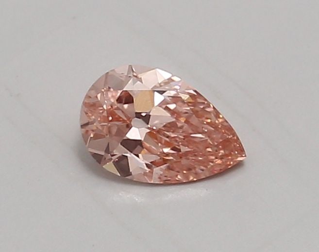 Loose Diamond - PEAR 0.57ct Fancy Vivid Pink VS1: Loose Diamond - PEAR 0.57ct Fancy Vivid Pink VS1 Source: This is a real non-mined Diamond that has been grown in a lab Shape: PEAR Carats: 0.57 Color: Fancy Vivid Pink Certification: IGI Video: