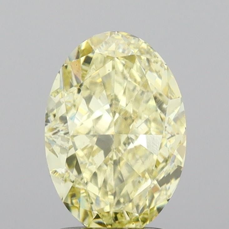 Loose Diamond - OVAL 2.05ct Fancy Light Yellow VVS2: Loose Diamond - OVAL 2.05ct Fancy Light Yellow VVS2 Source: This is a real non-mined Diamond that has been grown in a lab Shape: OVAL Carats: 2.05 Color: Fancy Light Yellow Certification: IGI Video: