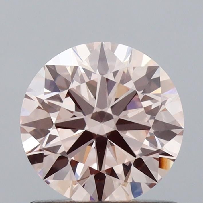 Ideal Loose Diamond - ROUND 0.84ct Fancy Pink VS2: Ideal Loose Diamond - ROUND 0.84ct Fancy Pink VS2 Source: This is a real non-mined Diamond that has been grown in a lab Shape: ROUND Carats: 0.84 Color: Fancy Pink Certification: IGI Video: