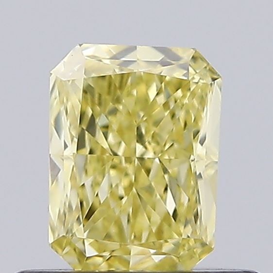 Loose Diamond - RADIANT 0.51ct Fancy Vivid Yellow VVS2: Loose Diamond - RADIANT 0.51ct Fancy Vivid Yellow VVS2 Source: This is a real non-mined Diamond that has been grown in a lab Shape: RADIANT Carats: 0.51 Color: Fancy Vivid Yellow Certification: IGI Vi