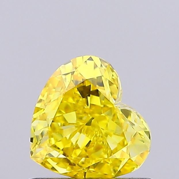 Loose Diamond - HEART 0.76ct Fancy Vivid Yellow VVS2: Loose Diamond - HEART 0.76ct Fancy Vivid Yellow VVS2 Source: This is a real non-mined Diamond that has been grown in a lab Shape: HEART Carats: 0.76 Color: Fancy Vivid Yellow Certification: NONE