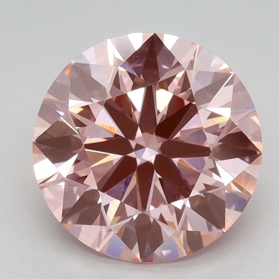 Ideal Loose Diamond - ROUND 2.6ct Fancy Vivid Pink VS1: Ideal Loose Diamond - ROUND 2.6ct Fancy Vivid Pink VS1 Source: This is a real non-mined Diamond that has been grown in a lab Shape: ROUND Carats: 2.6 Color: Fancy Vivid Pink Certification: IGI Video: