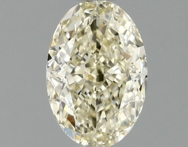 Loose Diamond - OVAL 1.1ct Fancy Yellow VVS2: Loose Diamond - OVAL 1.1ct Fancy Yellow VVS2 Source: This is a real non-mined Diamond that has been grown in a lab Shape: OVAL Carats: 1.1 Color: Fancy Yellow Certification: IGI Video: