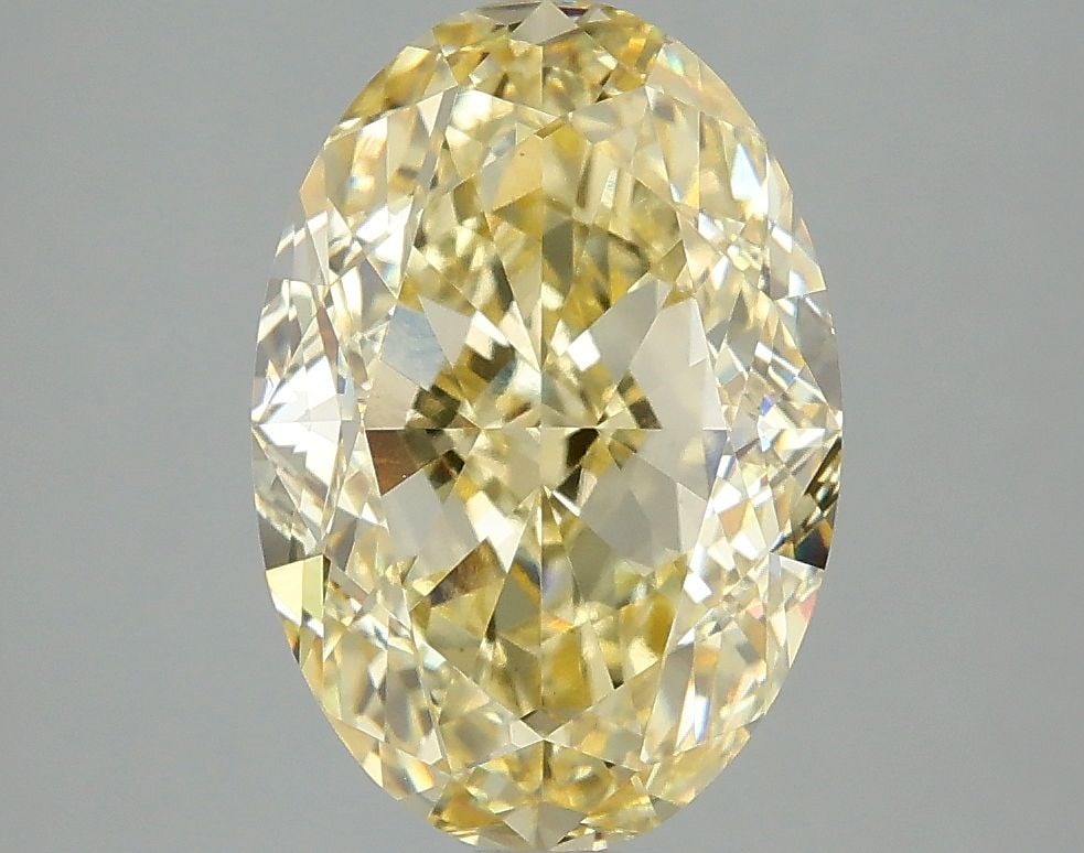 Loose Diamond - OVAL 4.06ct Fancy Intense Yellow VS1: Loose Diamond - OVAL 4.06ct Fancy Intense Yellow VS1 Source: This is a real non-mined Diamond that has been grown in a lab Shape: OVAL Carats: 4.06 Color: Fancy Intense Yellow Certification: IGI Video