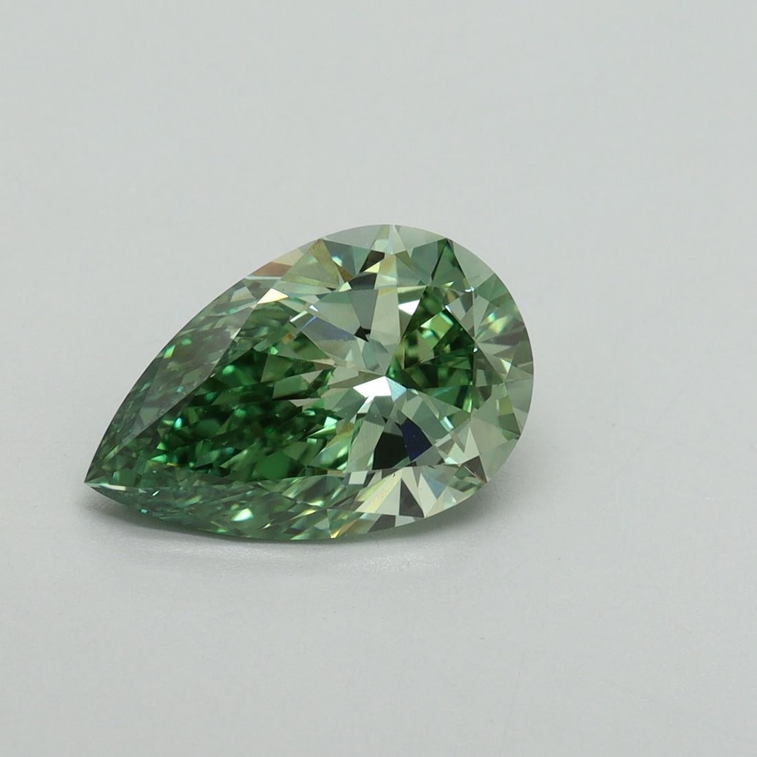 Loose Diamond - PEAR 2.15ct Fancy Vivid Green VS1: Loose Diamond - PEAR 2.15ct Fancy Vivid Green VS1 Source: This is a real non-mined Diamond that has been grown in a lab Shape: PEAR Carats: 2.15 Color: Fancy Vivid Green Certification: IGI Video: