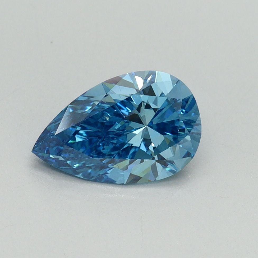 Loose Diamond - PEAR 1.03ct Fancy Vivid Blue VS1: Loose Diamond - PEAR 1.03ct Fancy Vivid Blue VS1 Source: This is a real non-mined Diamond that has been grown in a lab Shape: PEAR Carats: 1.03 Color: Fancy Vivid Blue Certification: IGI Video: