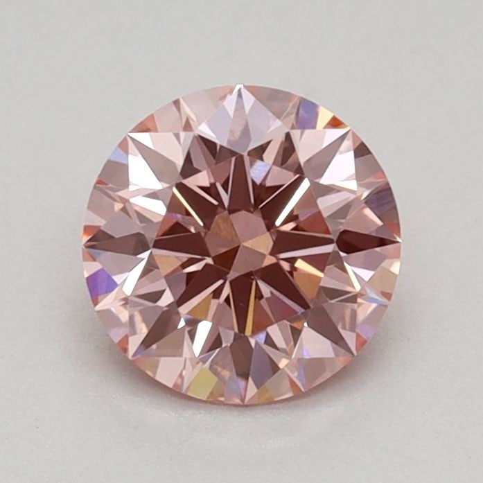 Ideal Loose Diamond - ROUND 0.61ct Fancy Vivid Pink VS1: Ideal Loose Diamond - ROUND 0.61ct Fancy Vivid Pink VS1 Source: This is a real non-mined Diamond that has been grown in a lab Shape: ROUND Carats: 0.61 Color: Fancy Vivid Pink Certification: IGI Video