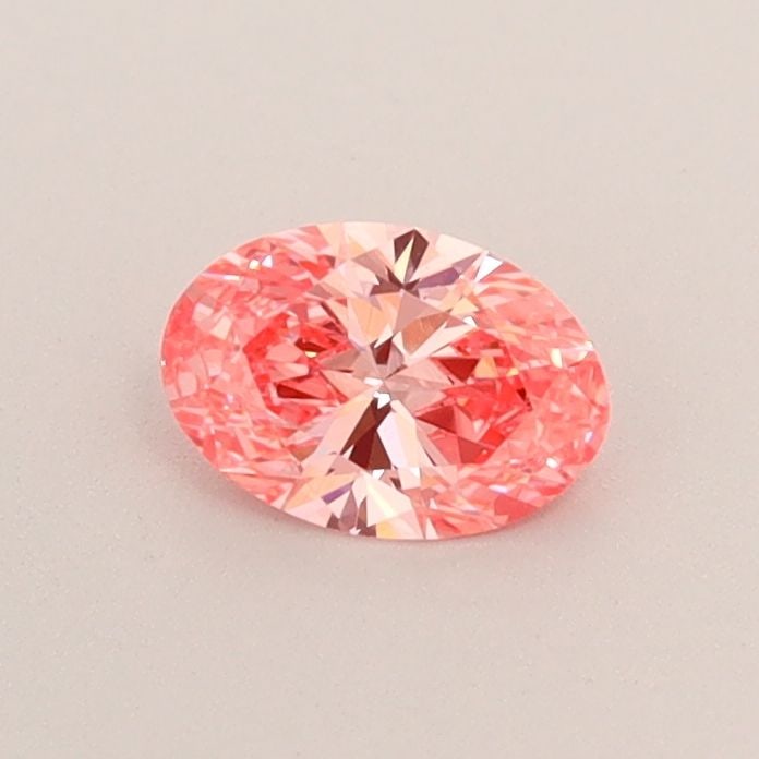 Loose Diamond - OVAL 0.35ct Fancy Vivid Pink VVS2: Loose Diamond - OVAL 0.35ct Fancy Vivid Pink VVS2 Source: This is a real non-mined Diamond that has been grown in a lab Shape: OVAL Carats: 0.35 Color: Fancy Vivid Pink Certification: IGI Video: