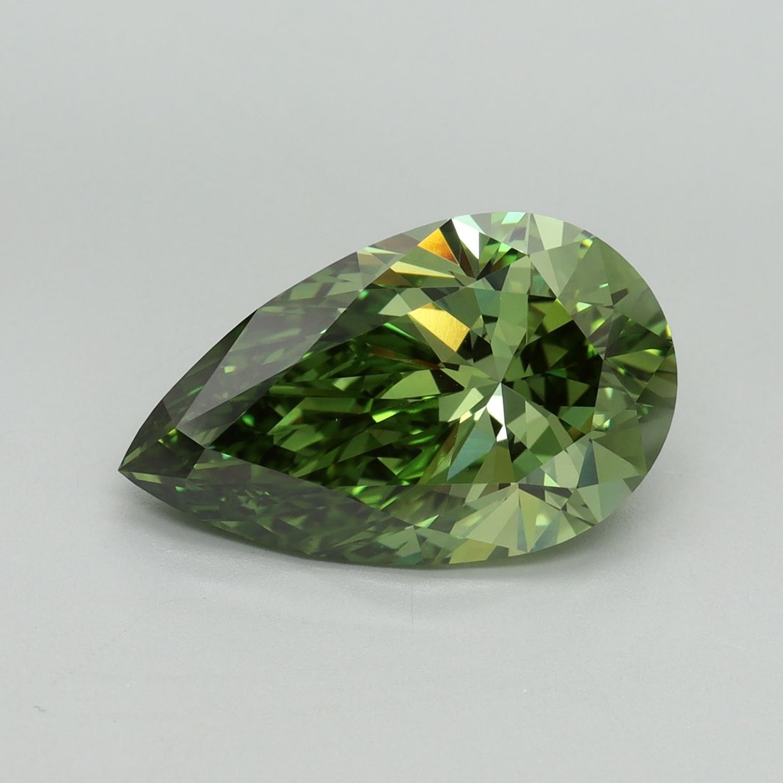 Loose Diamond - PEAR 5.09ct Fancy Vivid Green VVS2: Loose Diamond - PEAR 5.09ct Fancy Vivid Green VVS2 Source: This is a real non-mined Diamond that has been grown in a lab Shape: PEAR Carats: 5.09 Color: Fancy Vivid Green Certification: IGI Video: