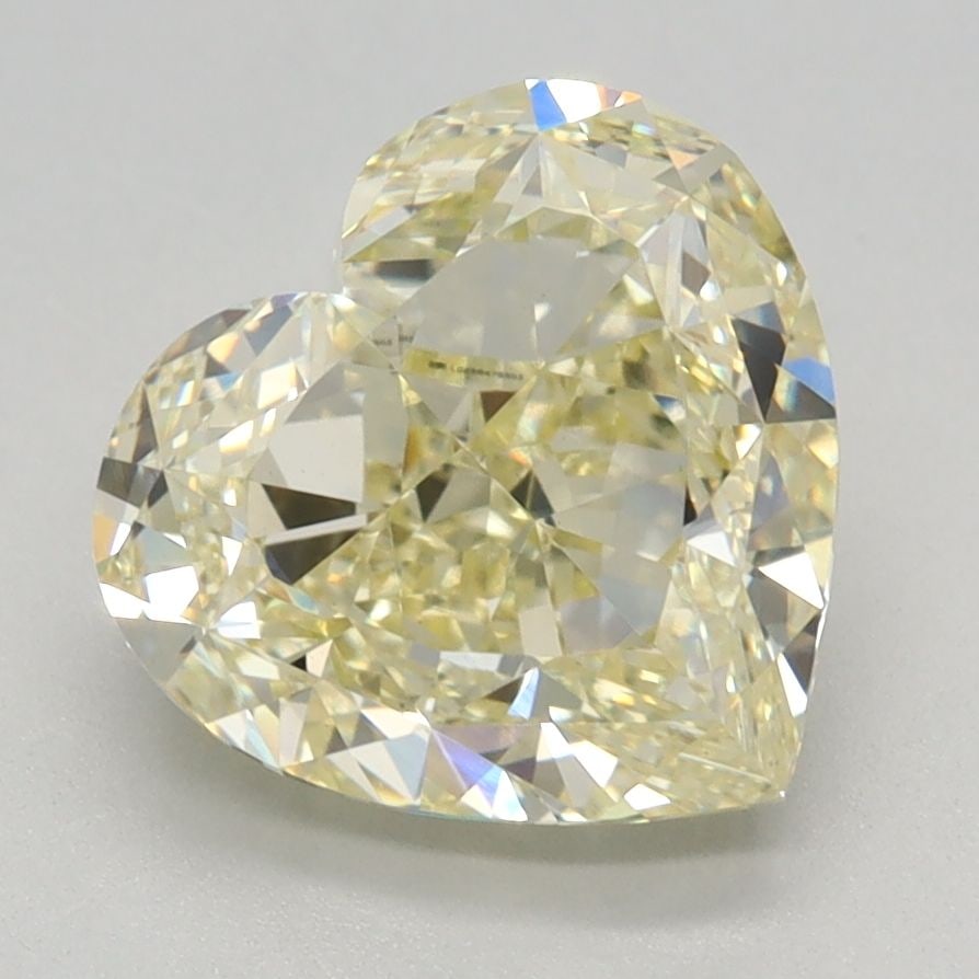 Loose Diamond - HEART 2.6ct Fancy Light Yellow VVS2: Loose Diamond - HEART 2.6ct Fancy Light Yellow VVS2 Source: This is a real non-mined Diamond that has been grown in a lab Shape: HEART Carats: 2.6 Color: Fancy Light Yellow Certification: IGI Video: