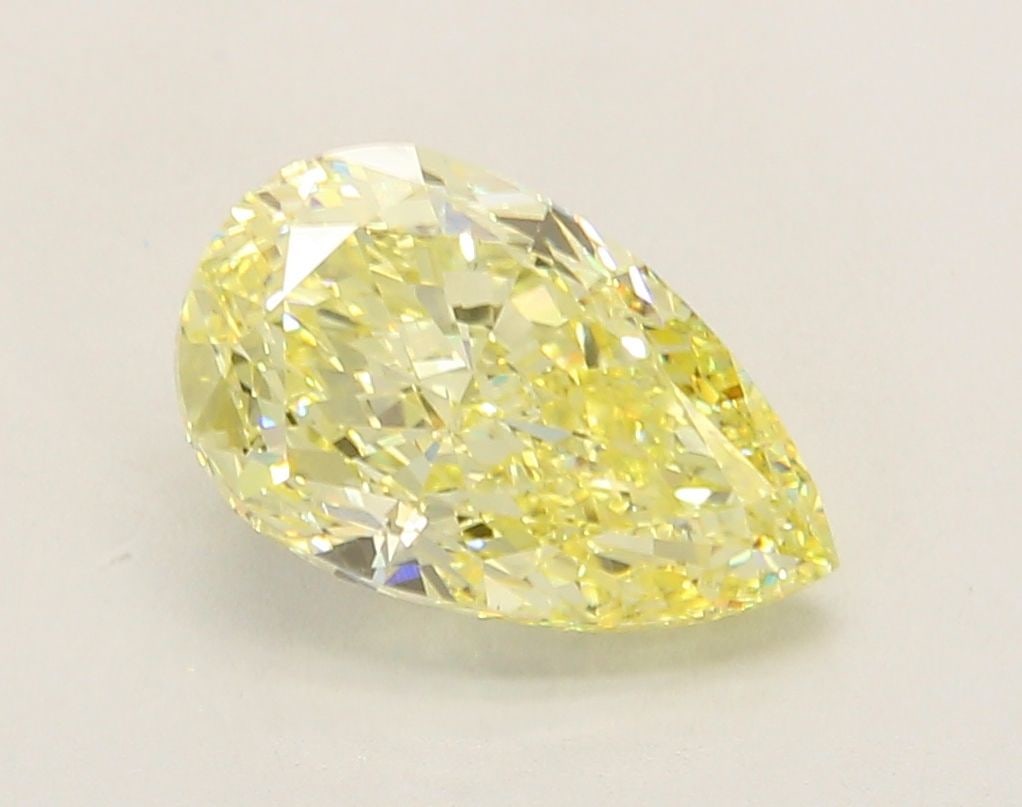 Loose Diamond - PEAR 3.23ct Fancy Yellow VS1: Loose Diamond - PEAR 3.23ct Fancy Yellow VS1 Source: This is a real non-mined Diamond that has been grown in a lab Shape: PEAR Carats: 3.23 Color: Fancy Yellow Certification: IGI Video: