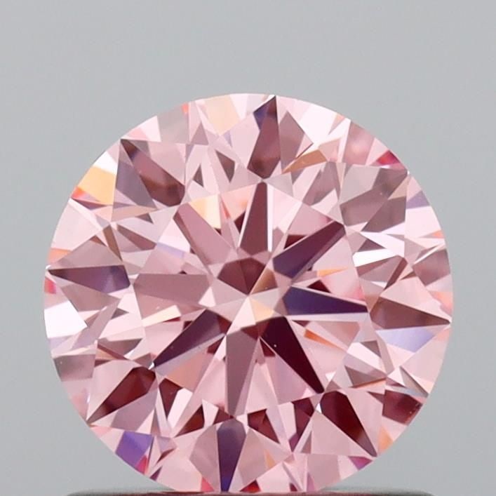 Ideal Loose Diamond - ROUND 0.95ct Fancy Vivid Pink VVS2: Ideal Loose Diamond - ROUND 0.95ct Fancy Vivid Pink VVS2 Source: This is a real non-mined Diamond that has been grown in a lab Shape: ROUND Carats: 0.95 Color: Fancy Vivid Pink Certification: IGI Vide
