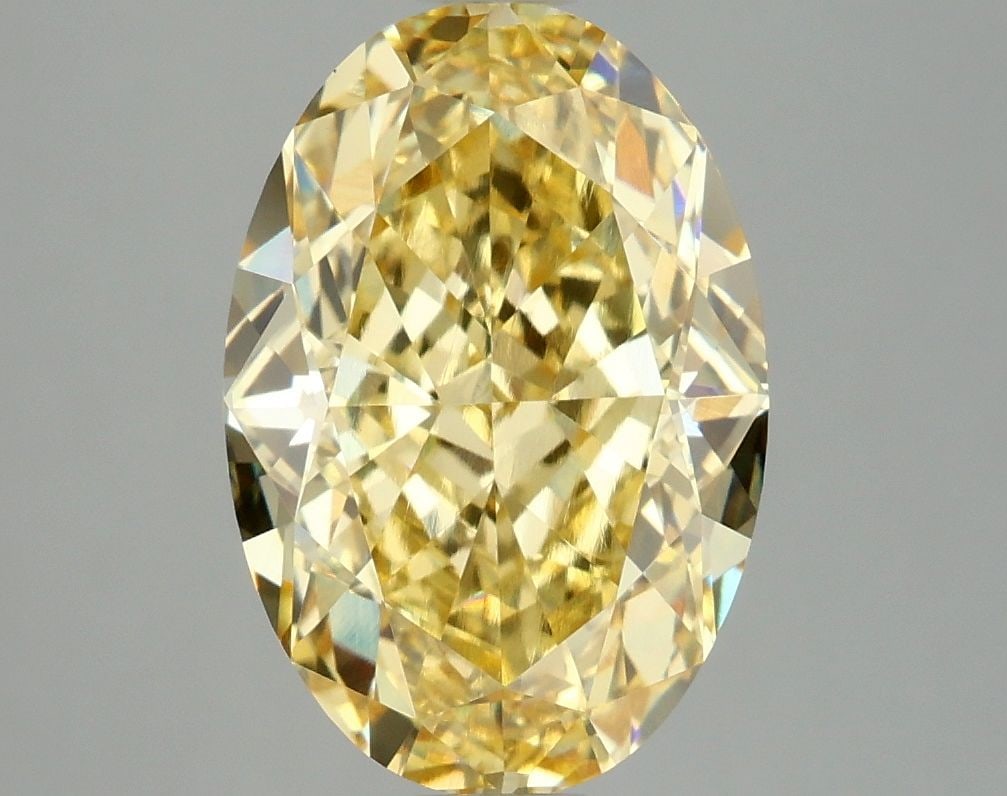 Loose Diamond - OVAL 4.09ct Fancy Vivid Yellow VVS2: Loose Diamond - OVAL 4.09ct Fancy Vivid Yellow VVS2 Source: This is a real non-mined Diamond that has been grown in a lab Shape: OVAL Carats: 4.09 Color: Fancy Vivid Yellow Certification: IGI Video: