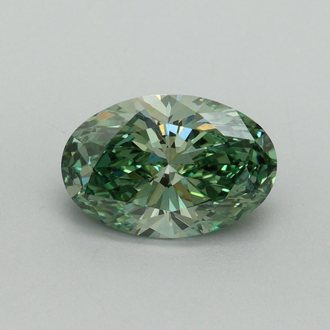 Loose Diamond - OVAL 1.67ct Fancy Vivid Green VS1: Loose Diamond - OVAL 1.67ct Fancy Vivid Green VS1 Source: This is a real non-mined Diamond that has been grown in a lab Shape: OVAL Carats: 1.67 Color: Fancy Vivid Green Certification: IGI Video: